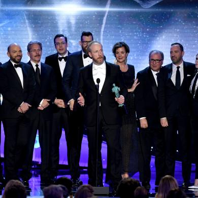 Matt Walsh (C, holding award trophy) and castmates from 'Veep'